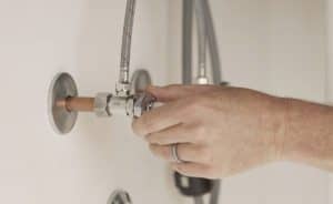 Turning of the valves for removing kitchen faucet without basin wrench